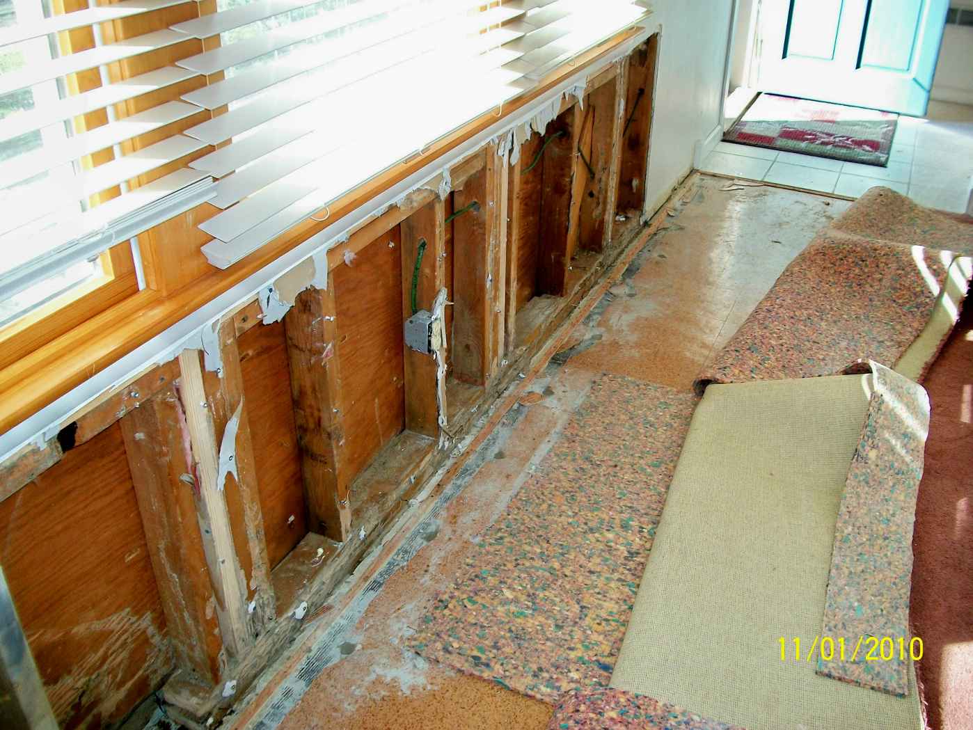 Termite Damaged baseboards, sill plates, wall studs, jack studs and headers